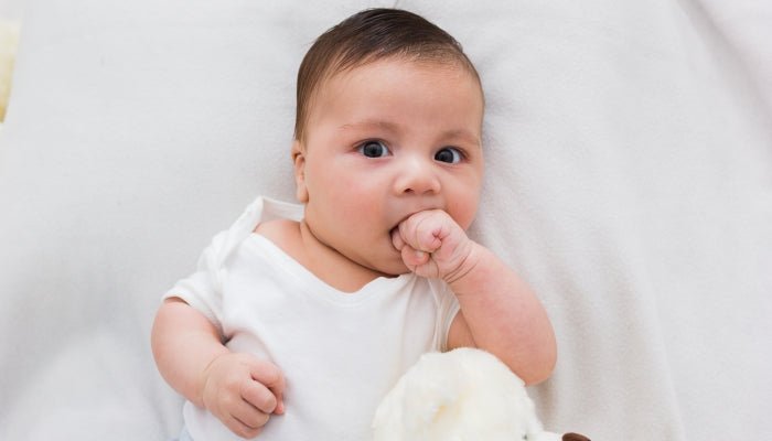 Is Baby Hand Sucking a Bad Habit? When to Swap Hands for Teethers - Zezebaebae