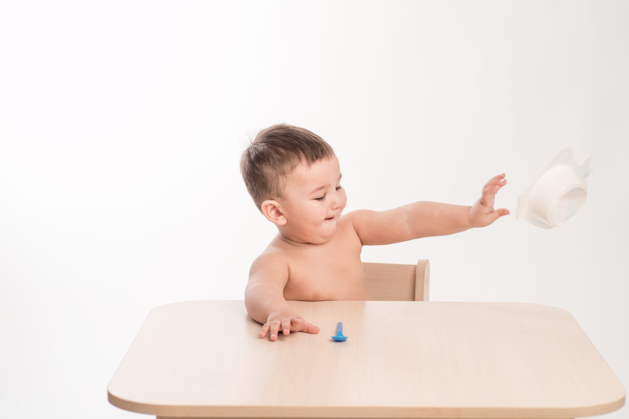 Why Babies Throw Things: A Healthy Sign of Growth - Zezebaebae
